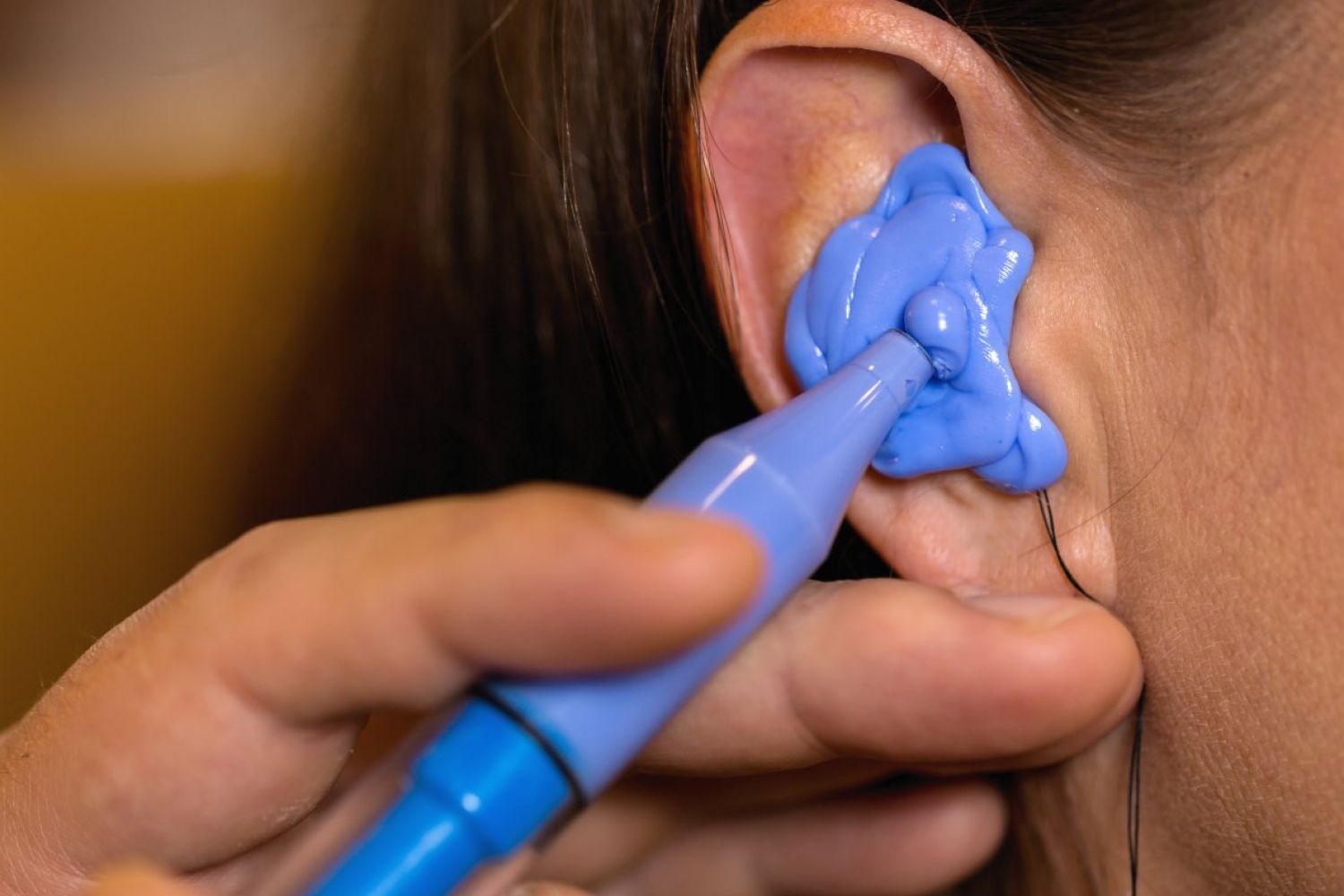 Demonstration of a molded ear plug at Timaru Occupational Health and Safety